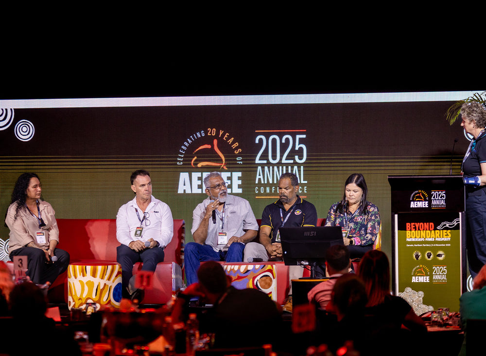 A prominent expert panel of First Nations corporate leaders and resource sector executives speaking on stage during a key policy session at the AEMEE Annual Conference.