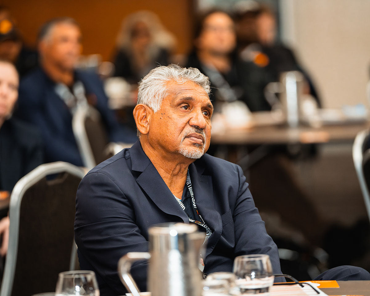 Delegate seated and listening during a conference session at the 2024 AEMEE Annual Conference in Fremantle, WA.