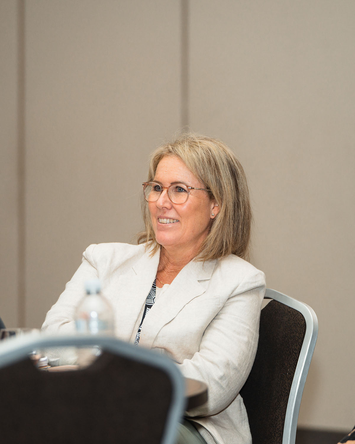 Delegate seated and listening during Session 1: Grounded Leadership at the 2024 AEMEE Annual Conference.