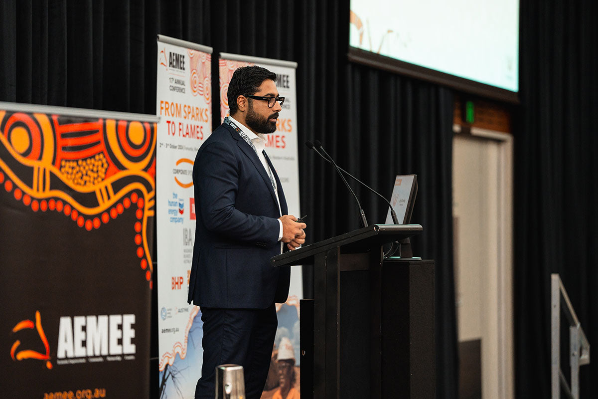 Waalitj Foundation representative Gohar Rhind addressing the crowd from the main stage, focusing on Equity & Ownership structures within the Indigenous business resources sector.