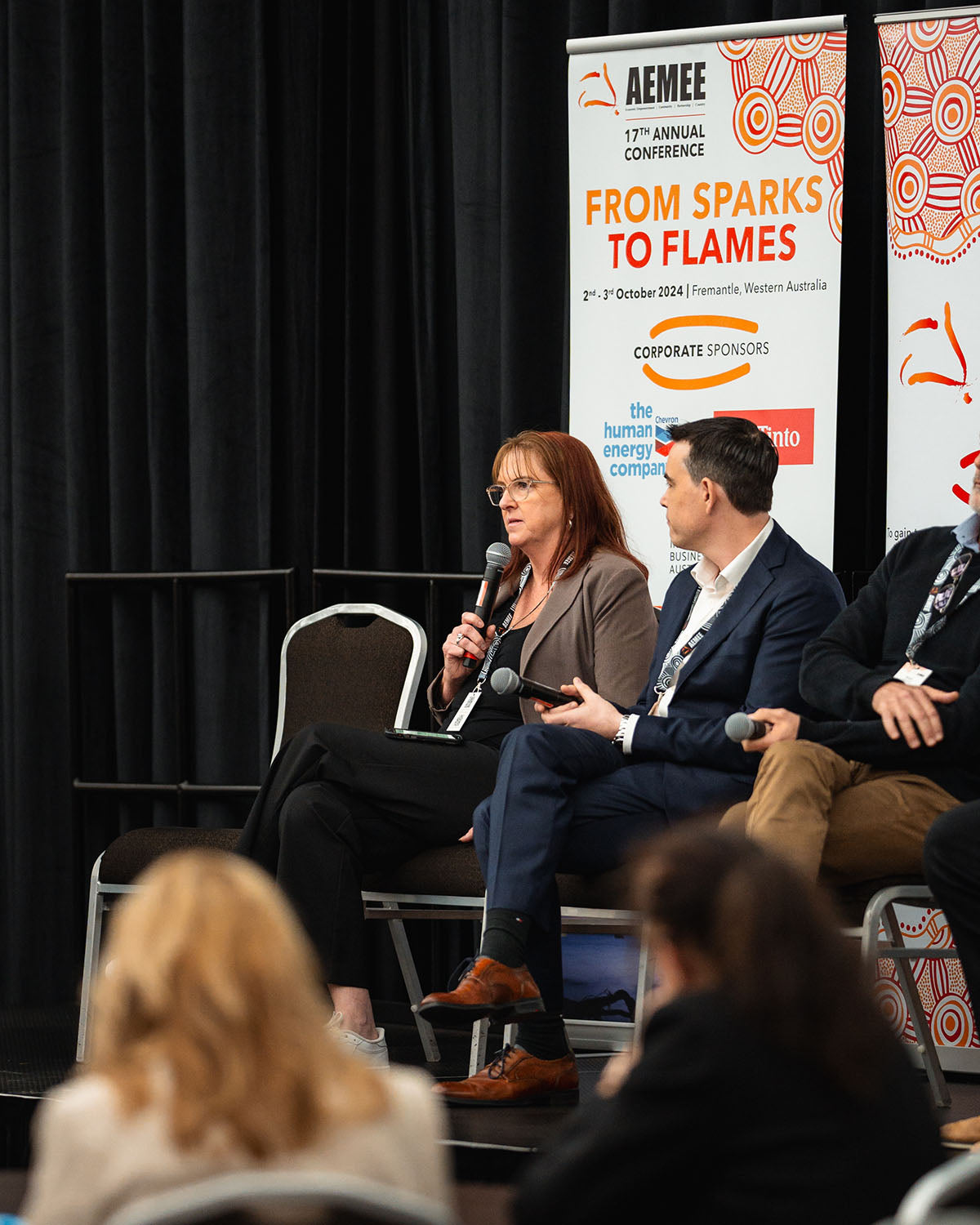 Matt Plichta of Rio Tinto listening closely to a fellow panelist speaking during a resource sector development stream breakout at the annual national AEMEE conference.