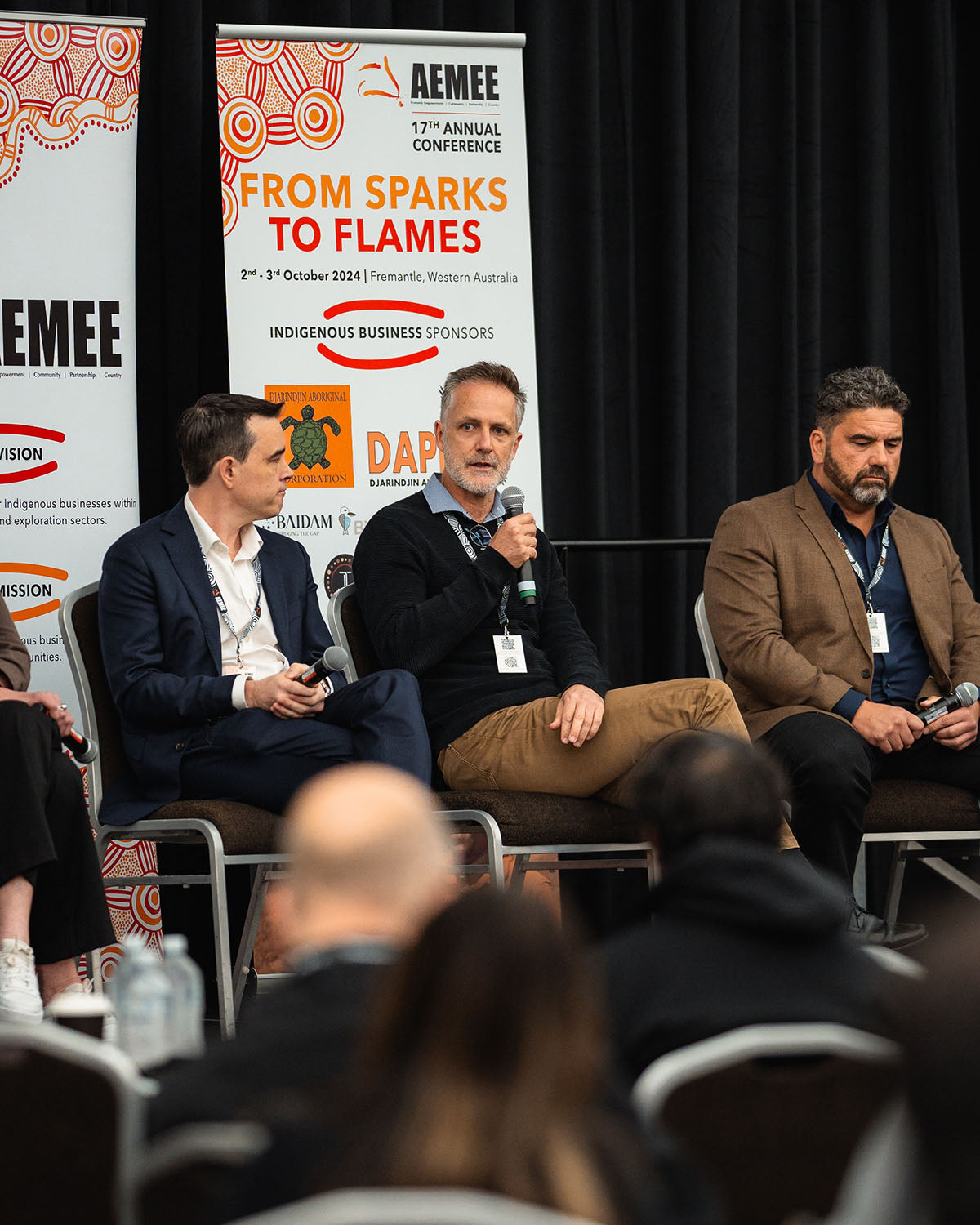 Panelists sharing industry data and procurement insights from the stage during a technical session at the national AEMEE conference.