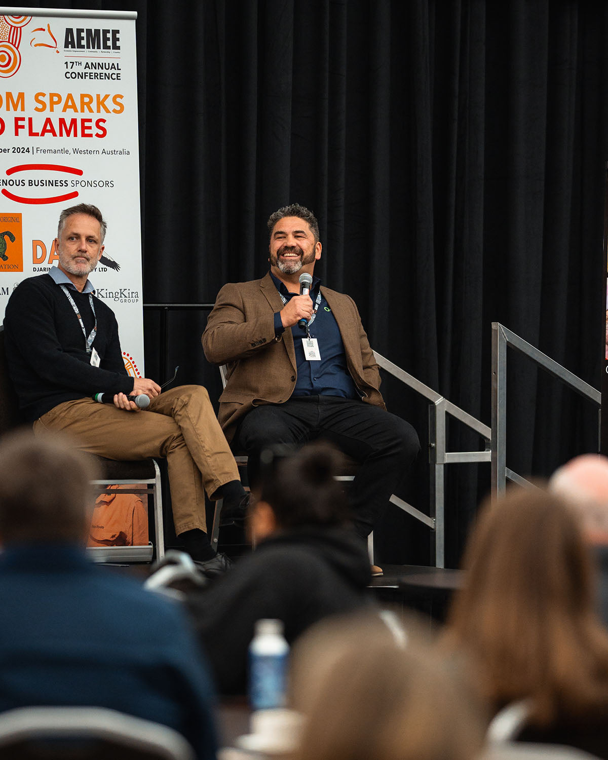 Commercial stakeholders conversing on stage during a breakout panel focused on structural growth within the Indigenous business resources sector.