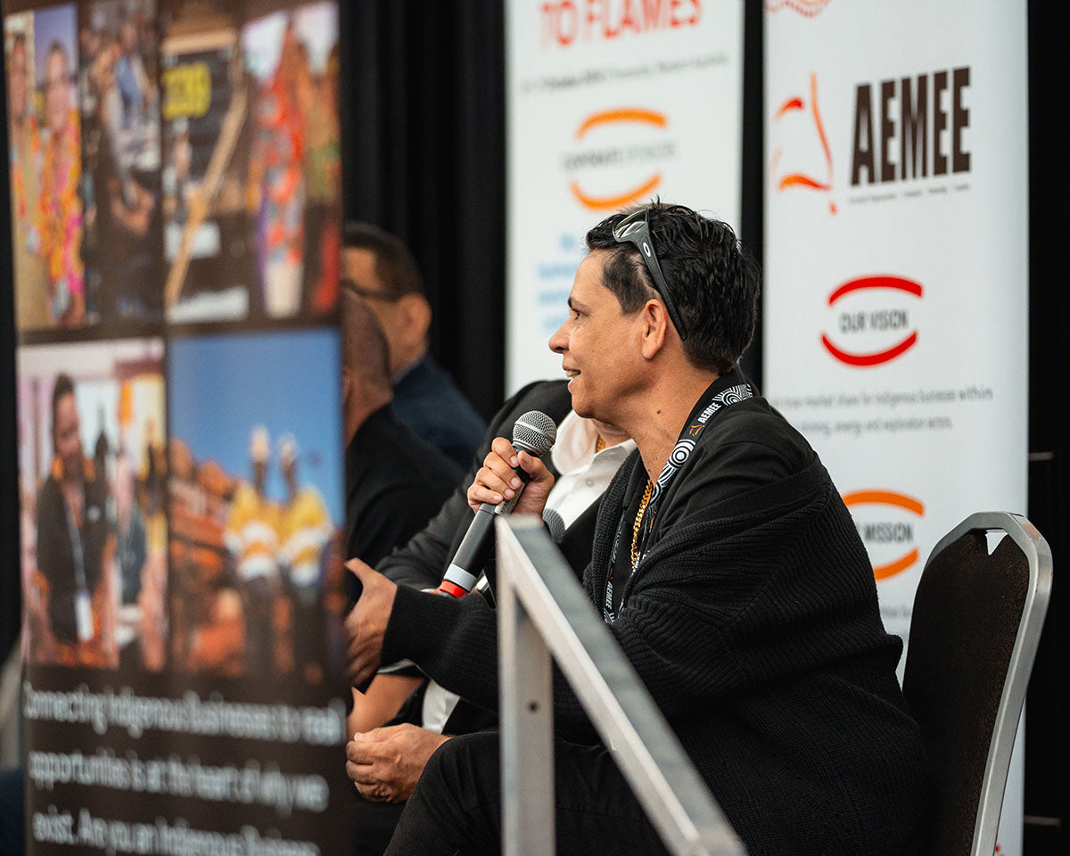 A close-up profile shot of Board Member Tammy O'Connor speaking during an interactive forum focused on leadership within the Indigenous business resources sector.