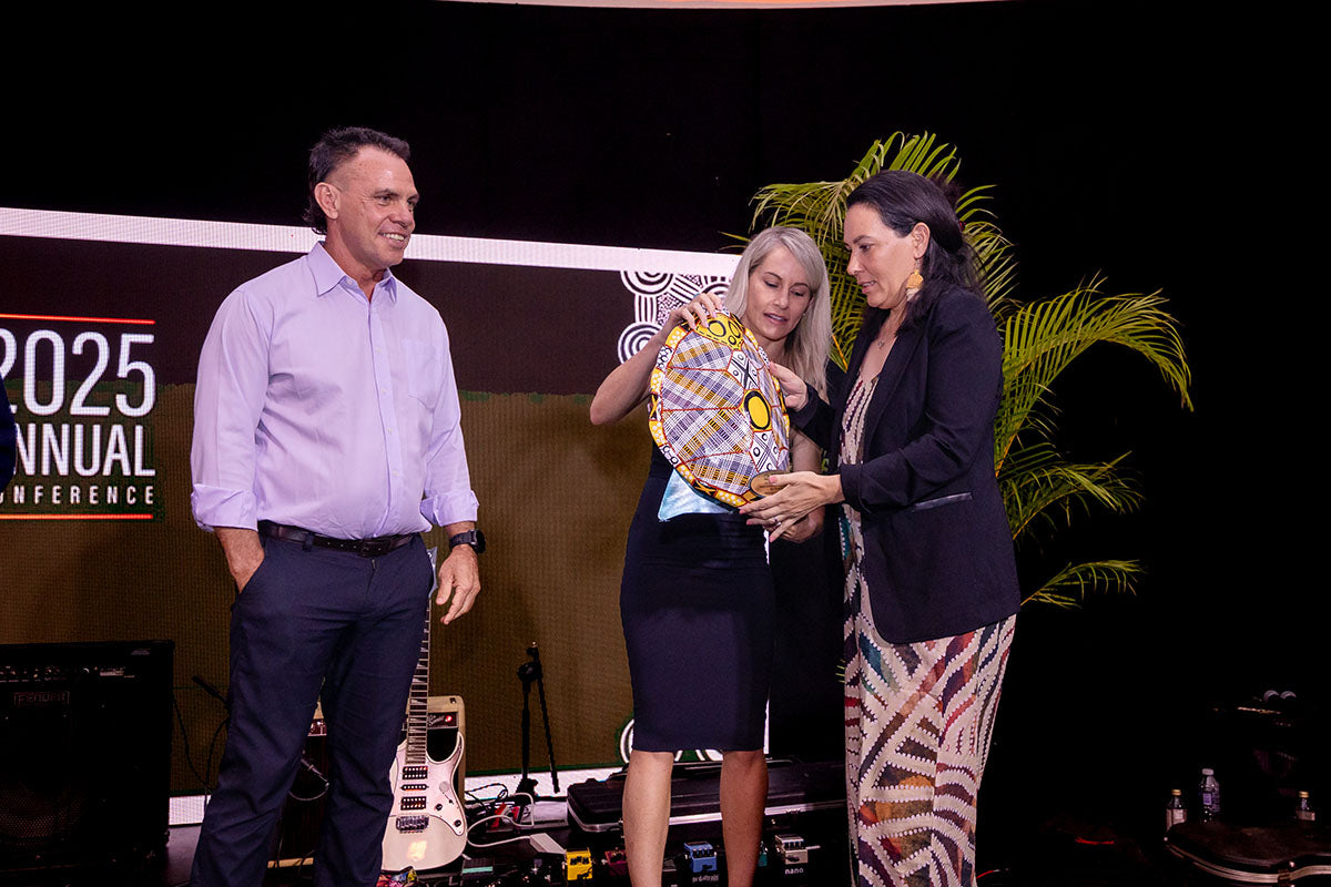 Kia Dowell receiving the 2025 Sector Champion of the Year Female award at the AEMEE 2025 Annual Conference.