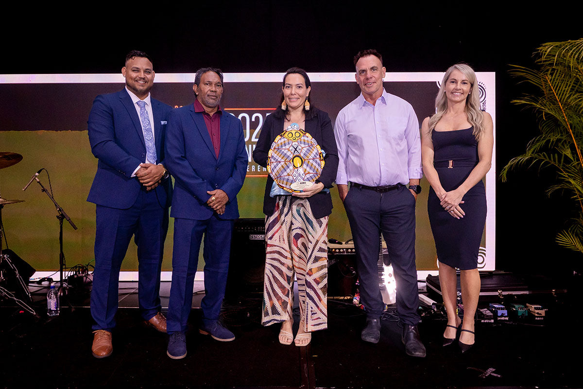 Kia Dowell receiving the 2025 Sector Champion of the Year Female award at the AEMEE 2025 Annual Conference.