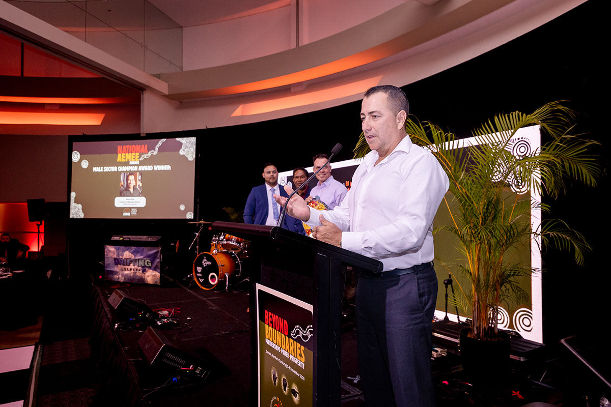 Steve Noy giving an acceptance speech at the AEMEE 2025 Annual Conference awards ceremony.