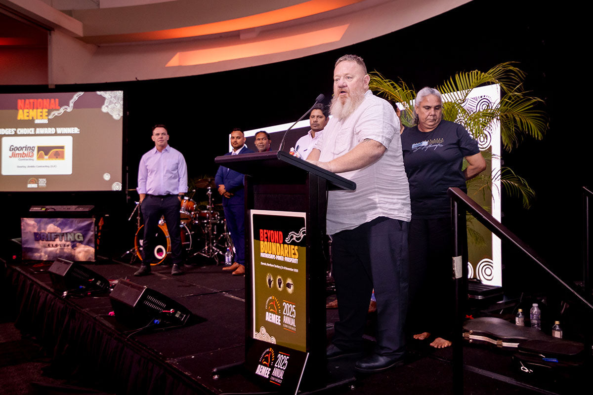 Gooring Jimbila Contracting receiving the 2025 Judges' Choice Award at the AEMEE 2025 Annual Conference.