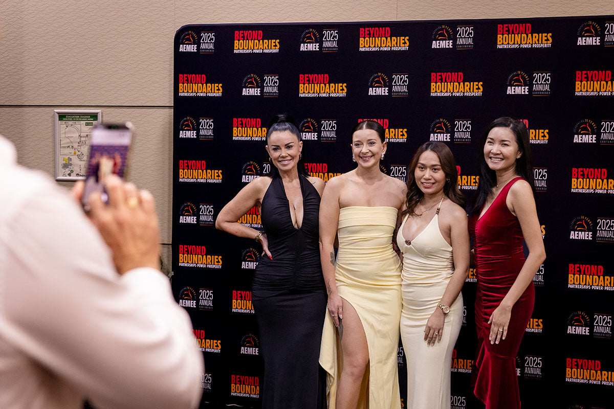 Guests being photographed at the AEMEE 2025 National Resource Sector Awards gala dinner — Beyond Boundaries backdrop, Darwin