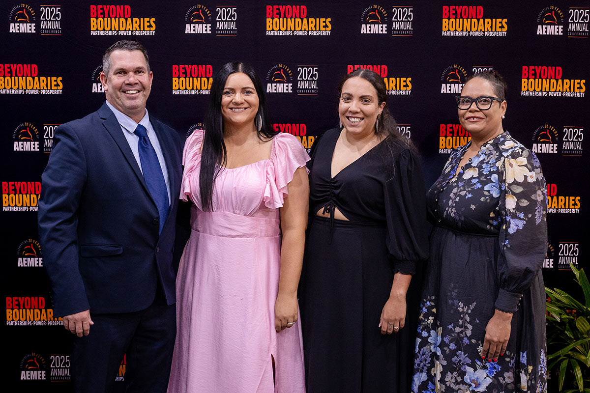 Delegates posing at the AEMEE 2025 National Resource Sector Awards gala dinner — Beyond Boundaries backdrop, Darwin