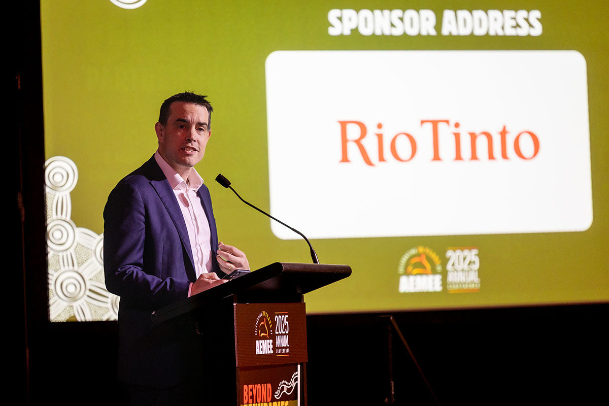 Presenter giving a Rio Tinto sponsor address at the AEMEE 2025 Annual Conference.