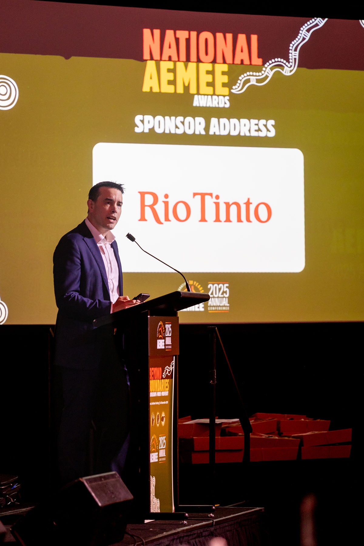 Speaker delivering a Rio Tinto sponsor address at the National AEMEE Awards.