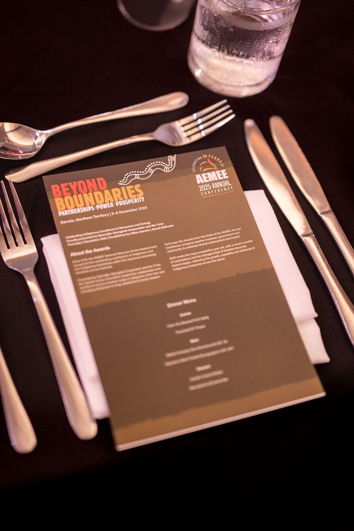 AEMEE 2025 National Resource Sector Awards gala dinner table setting with Beyond Boundaries program, Darwin