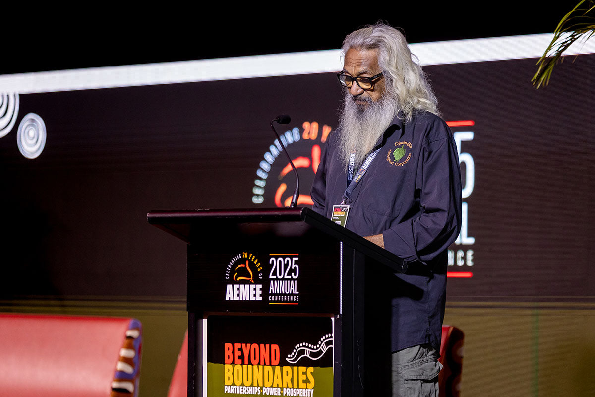 Indigenous Elder speaking at the AEMEE 2025 Annual Conference Day 1 — Beyond Boundaries: Partnerships, Power, Prosperity, Darwin