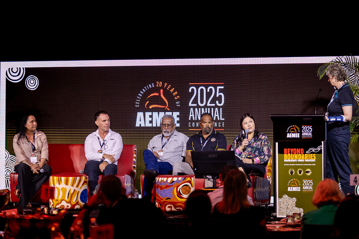 Delegates listening during an AEMEE conference session focused on Indigenous business and resources sector impact.