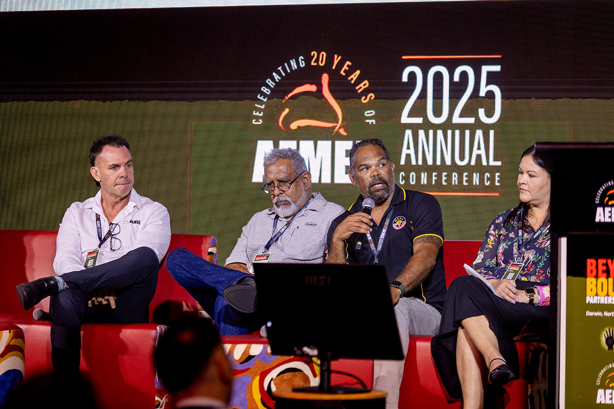 AEMEE conference speaker addressing delegates during a panel discussion on Indigenous business and resources sector collaboration.