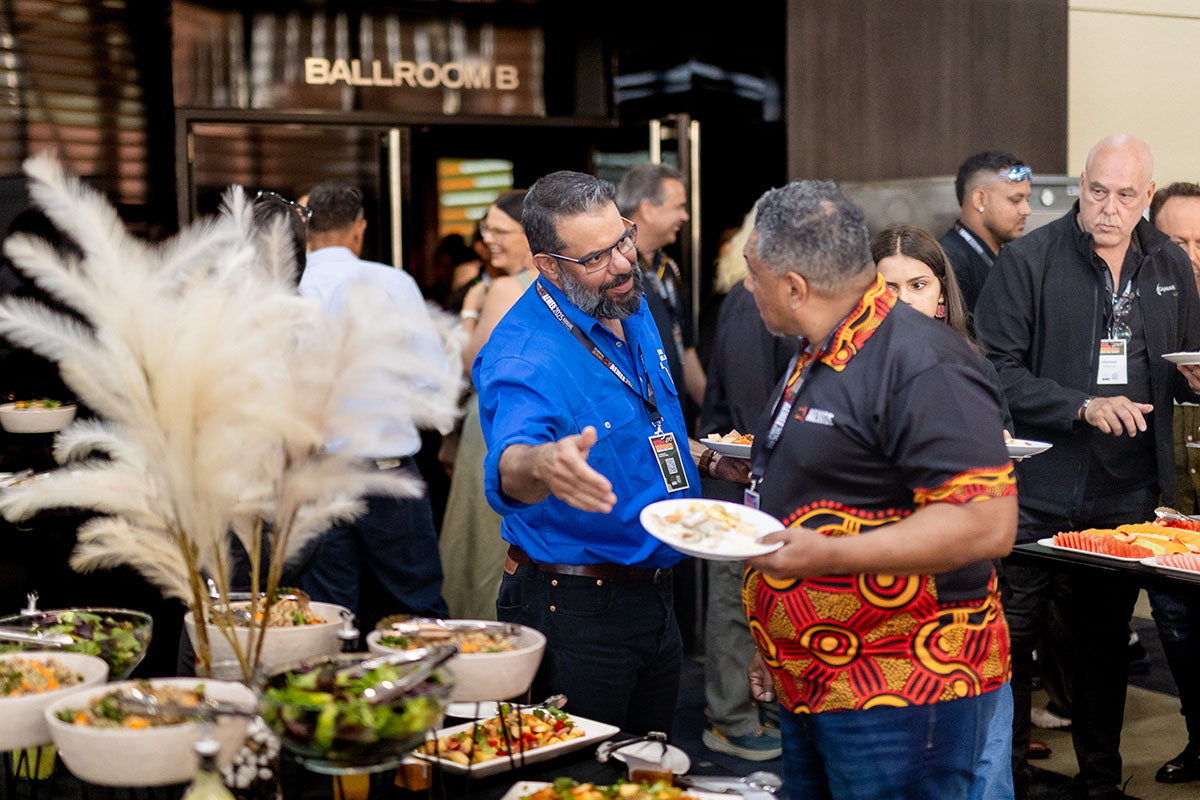 AEMEE conference attendees networking over lunch during an Indigenous business resources sector event.