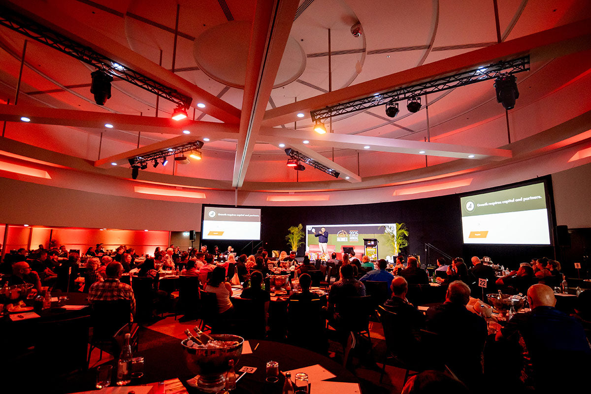 Wide view of the AEMEE 2025 Annual Conference audience and stage during a resources sector session.