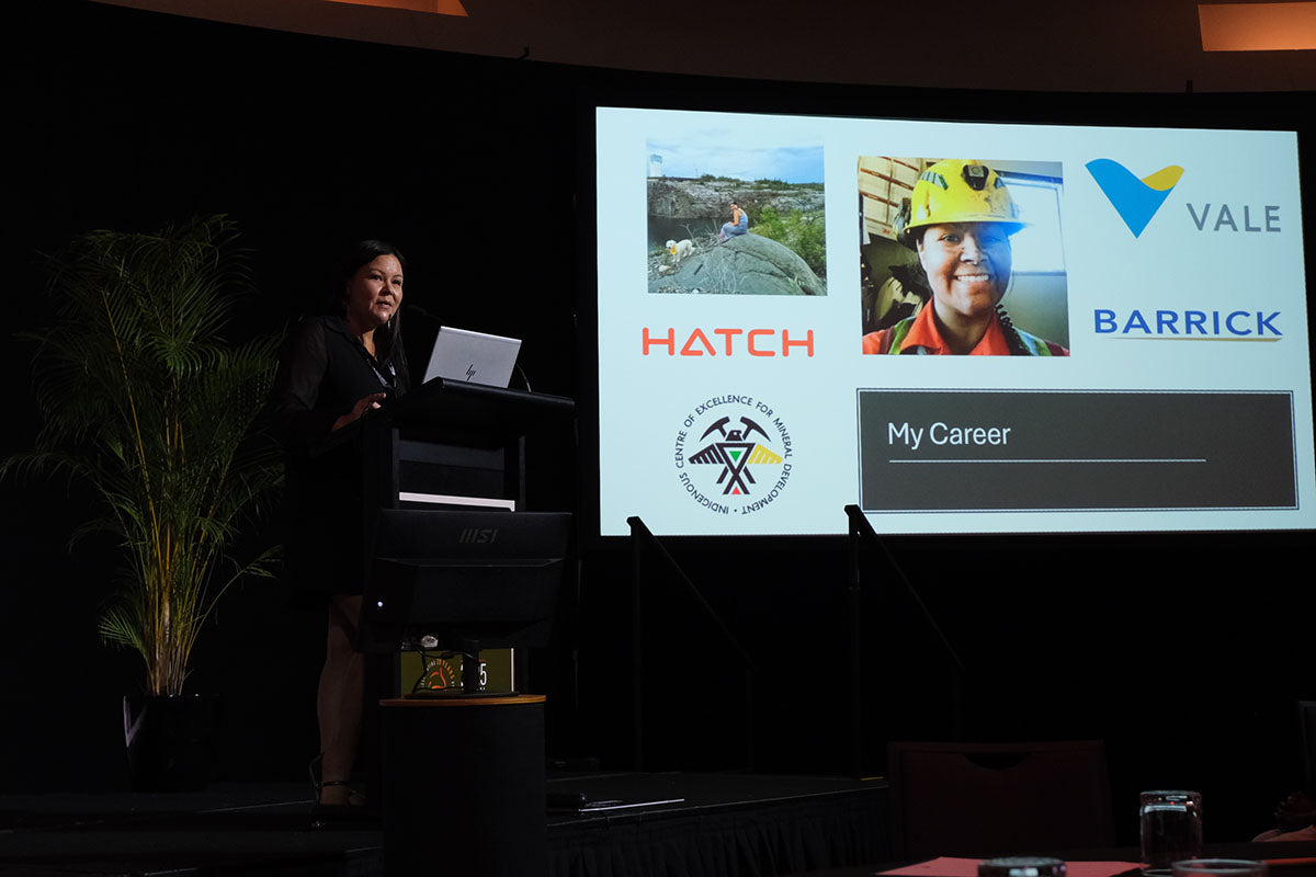 Presenter sharing career insights during an AEMEE conference session on Indigenous business and sector opportunities.