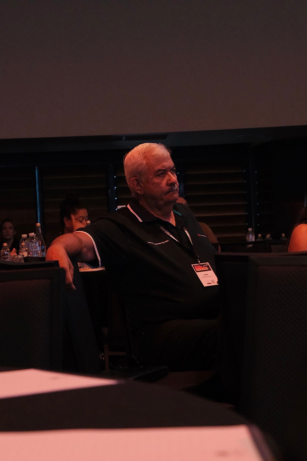 Delegate listening during an AEMEE conference discussion on Indigenous business and sector opportunities.