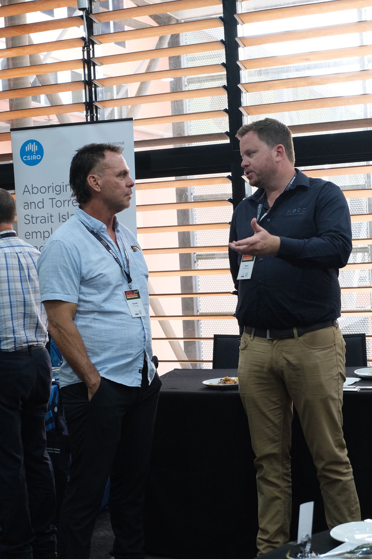 AEMEE board members networking during a break at the Indigenous business resources sector conference.