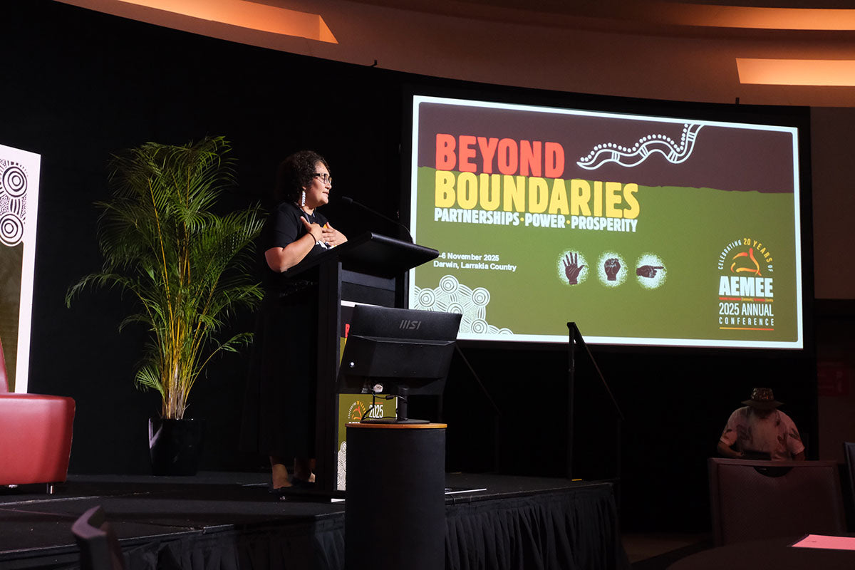 Presenter speaking at the AEMEE 2025 Annual Conference during a Beyond Boundaries session on Indigenous business and resources sector collaboration.