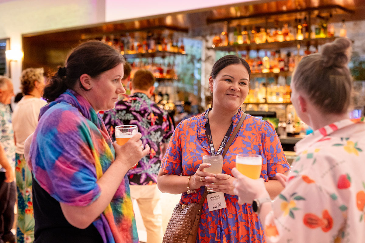 Delegates networking at the AEMEE 2025 Annual Conference networking night in Darwin